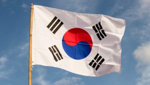 South Korea Flag Waving Against Clean Blue Sky