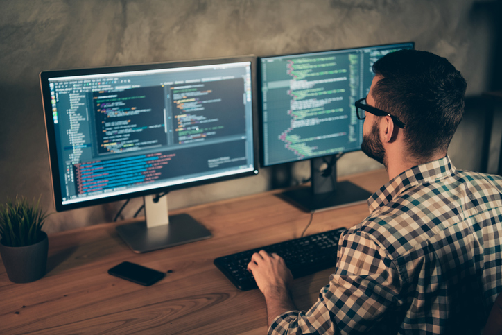 data scientist Profile Side View Of His He Nice Bearded Guy Wearing Checked Shirt Professional Expert Html Data Base Structure Screen At Wooden Industrial Interior Work Place Station