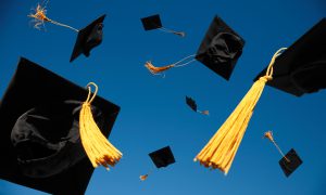 Graduation Caps Thrown In The Air