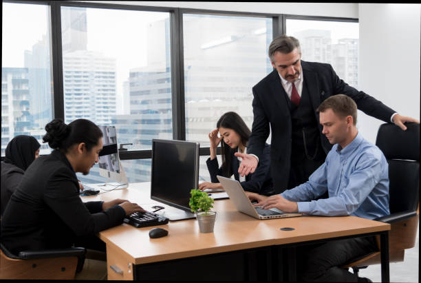 Frustrated Manager Is Angry At His Colleagues During A Meeting In The Office.