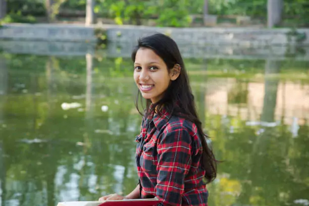 Girl Sitting Near River Testimonial 